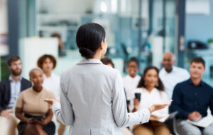 Teacher speaking to class