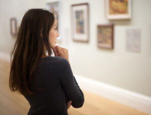 Woman in art gallery admiring 