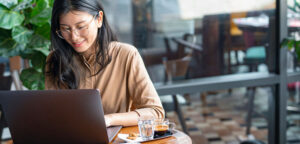 Woman studying remotely on computer