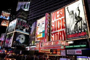 Broadway theater billboards at night