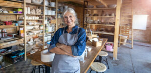 Female pottery artist in studio
