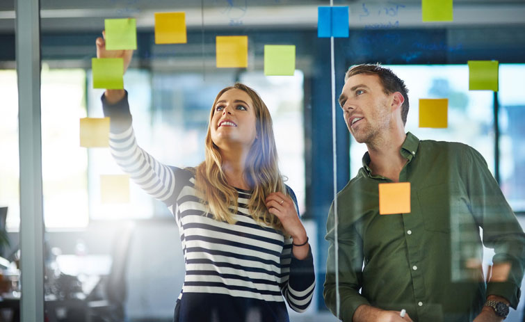 Content strategist working on project with co-worker