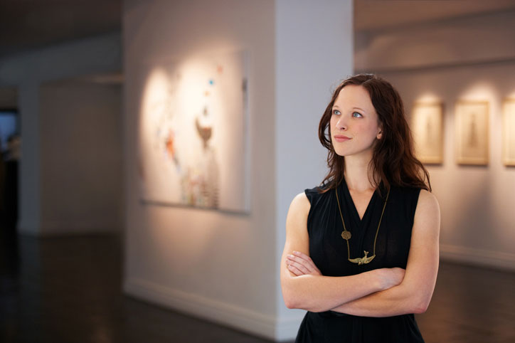 Female art curator in art gallery