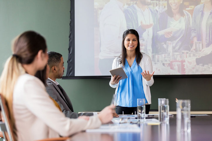 Nonprofit executive director giving presentation